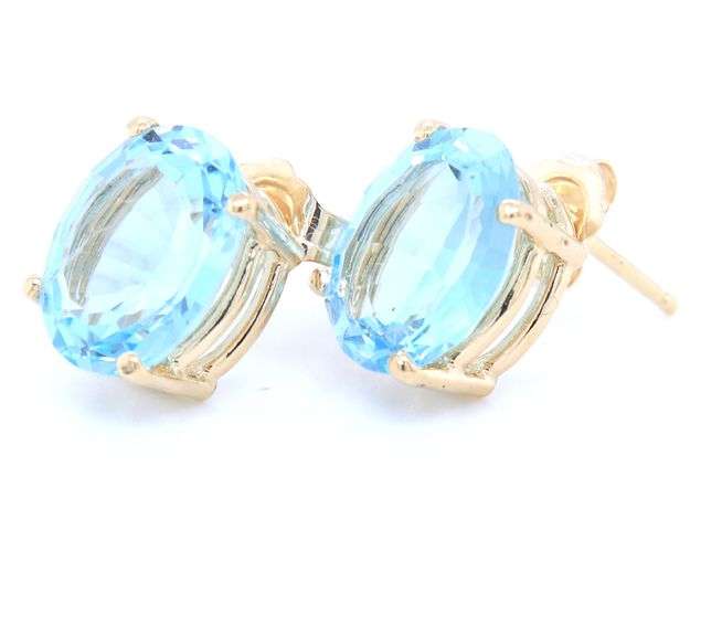 14kt Yellow gold oval blue topaz stud earrings