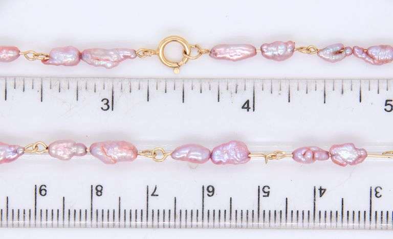 Pink pearl long necklace with yellow gold clasp