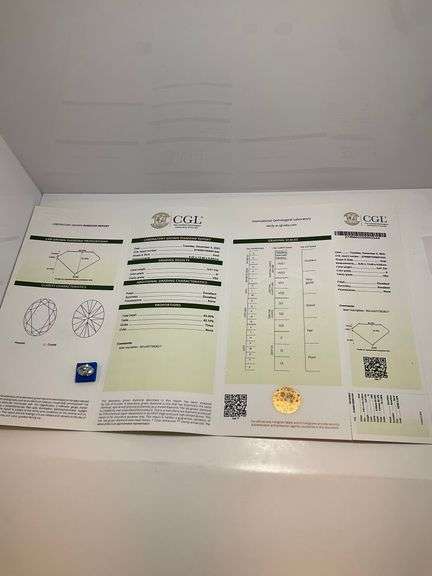 CERTIFIED 5.01 CARAT OVAL SHAPED DIAMOND.