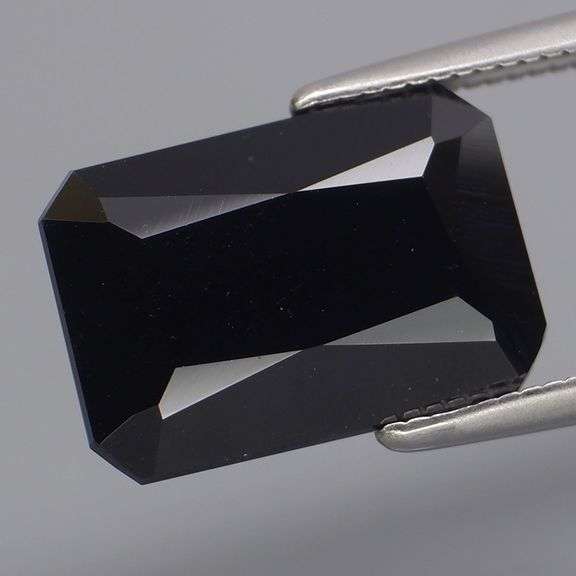 Elegant 6.72ct silky black Loas Tektite