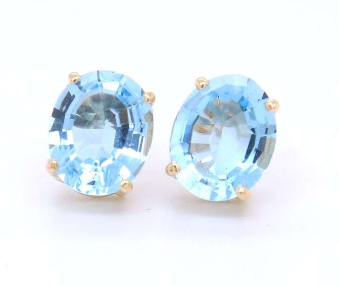 14kt Yellow gold oval blue topaz stud earrings