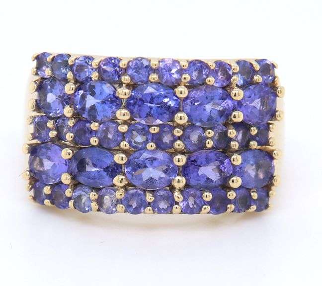 14kt Yellow gold oval and round Tanzanite cluster wide band