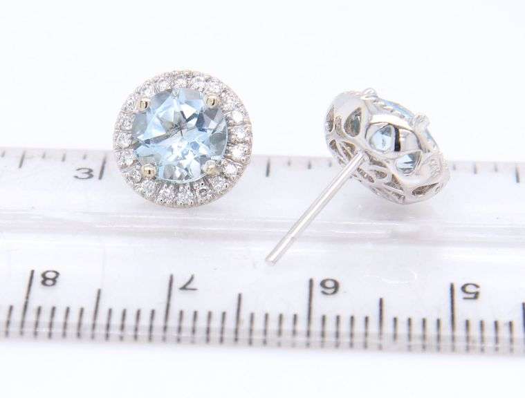 14kt White gold 2.50ctw aquamarine and diamond halo earrings