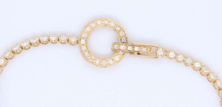 14kt Yellow gold 1ctw diamond bracelet with flip over circle clasp