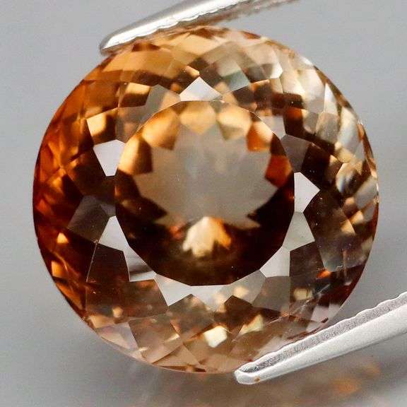 Stunning 12.47ct eye clean Imperial Topaz