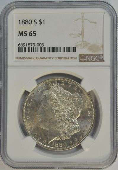 Solid blazing Gem BU 1880-S Morgan Silver Dollar. NGC MS65