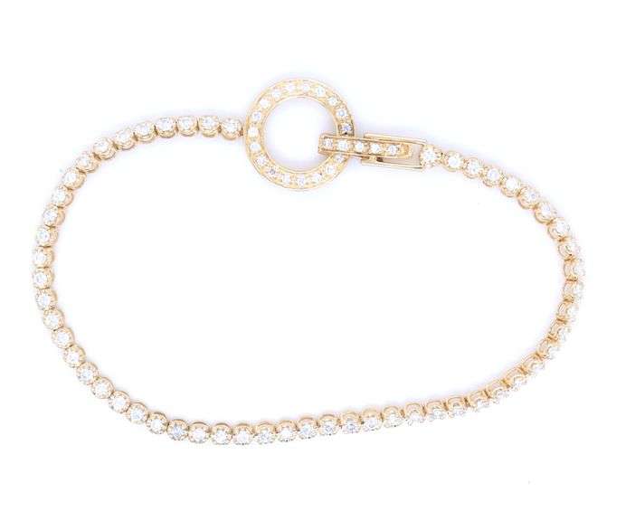 14kt Yellow gold 1ctw diamond bracelet with flip over circle clasp