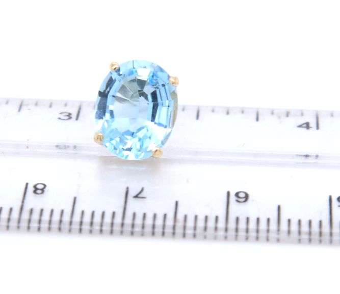 14kt Yellow gold oval blue topaz stud earrings