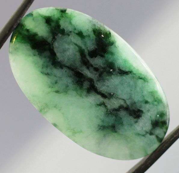 Glowing 46.80ct top quality Jadeite Jade cabochon