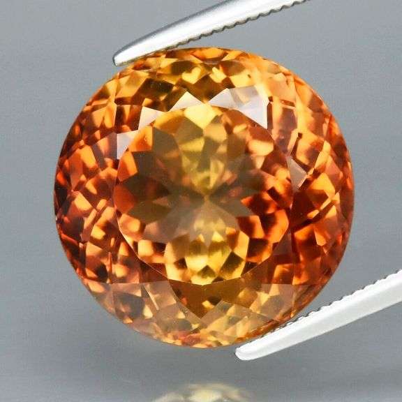 Simply ravishing 9.95ct VS Imperial Topaz solitaire