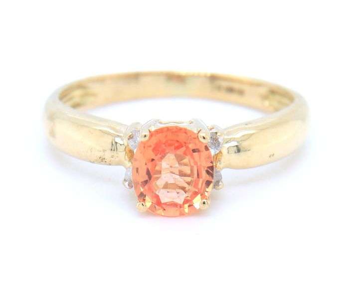 18kt Yellow gold 0.56ct Padaradscha sapphire and diamond accent ring