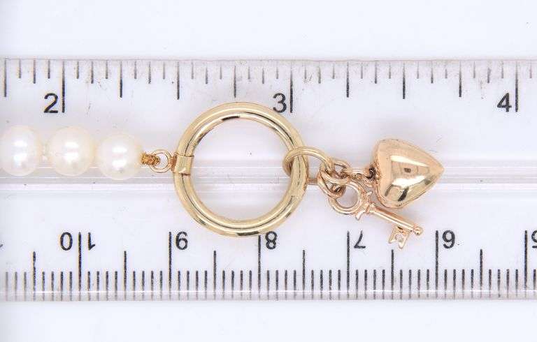 5.5mm White fresh water pearl bracelet with heart key charm