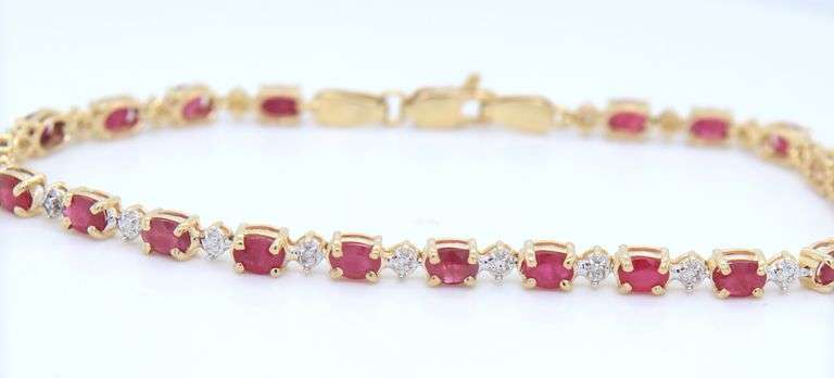 14kt Yellow gold oval Ruby and diamond tennis bracelet