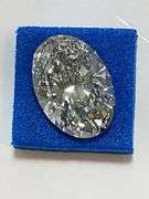 CERTIFIED 5.01 CARAT OVAL SHAPED DIAMOND.