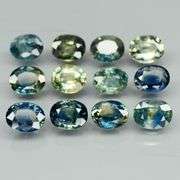 Heated only! 3.80ct blue green sapphire set