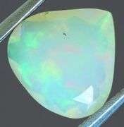 Tremendous glittering 1.23ct faceted Jelly Opal
