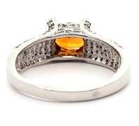 1.75ct Oval Orange Sapphire and 0.45ctw Diamond Ring in 14K