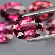 Remarkable 4.88ct violet pink Rhodolite Garnet set