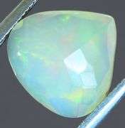 Tremendous glittering 1.23ct faceted Jelly Opal