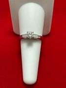 CERTIFIED PLATINUM DIAMOND SOLITAIRE RING. 0.57 CARAT
