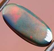 Fiery flashing 6ct Ethiopian bi-color Opal