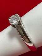 CERTIFIED PLATINUM DIAMOND SOLITAIRE RING. 0.57 CARAT