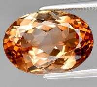 Exquisite 10.27ct bi-color Imperial Topaz