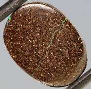 Intriguing 5.18ct crystal Boulder Opal