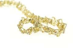 10K Yellow Gold 1.50 Ctw Diamond Wavy Link Classic Tennis Bracelet