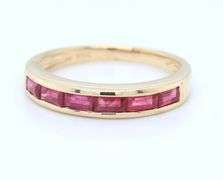 14kt Yellow gold baguette ruby band