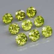 High grade 5.11ct untreated apple green Peridot set