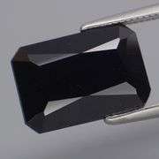 Elegant 6.72ct silky black Loas Tektite