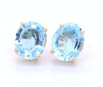 14kt Yellow gold oval blue topaz stud earrings
