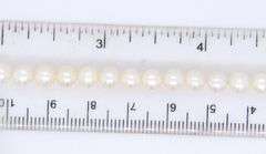 5.5mm White fresh water pearl bracelet with heart key charm