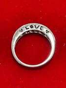 10K WHITE GOLD AND DIAMOND BAND