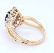 14kt Yellow gold oval blue sapphire and diamond halo marquise shaped ring