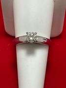 CERTIFIED PLATINUM DIAMOND SOLITAIRE RING. 0.57 CARAT
