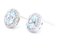 14kt White gold 2.50ctw aquamarine and diamond halo earrings