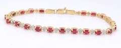 14kt Yellow gold oval Ruby and diamond tennis bracelet