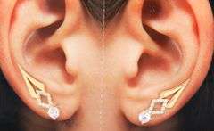 Diamond ear climber in 14kt yellow gold