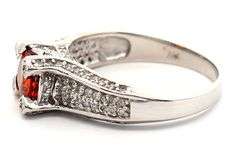 1.75ct Oval Orange Sapphire and 0.45ctw Diamond Ring in 14K