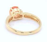 18kt Yellow gold 0.56ct Padaradscha sapphire and diamond accent ring