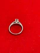 CERTIFIED PLATINUM DIAMOND SOLITAIRE RING. 0.57 CARAT