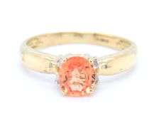 18kt Yellow gold 0.56ct Padaradscha sapphire and diamond accent ring