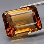 Lavish 12.07ct emerald cut Imperial Topaz