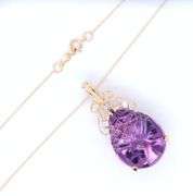 14kt Yellow gold fancy pear shaped amethyst and diamond pendant on chain necklace