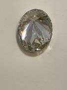 CERTIFIED 5.01 CARAT OVAL SHAPED DIAMOND.