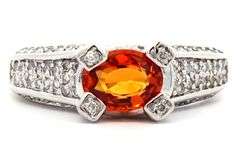 1.75ct Oval Orange Sapphire and 0.45ctw Diamond Ring in 14K