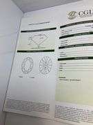 CERTIFIED 5.01 CARAT OVAL SHAPED DIAMOND.