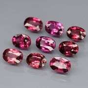 Remarkable 4.88ct violet pink Rhodolite Garnet set